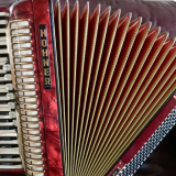Hohner - red & gold open bellows